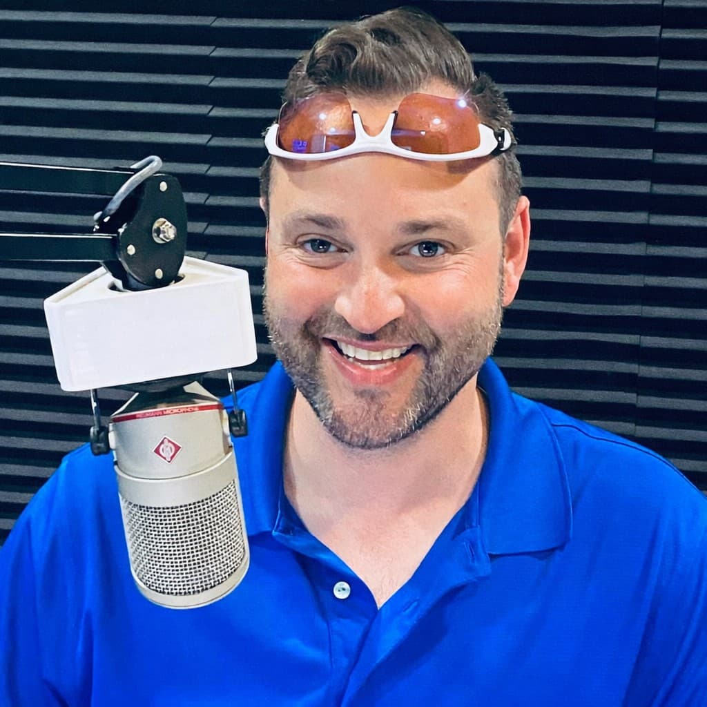 Rob Daniels in a professional radio studio, voice acting and recording